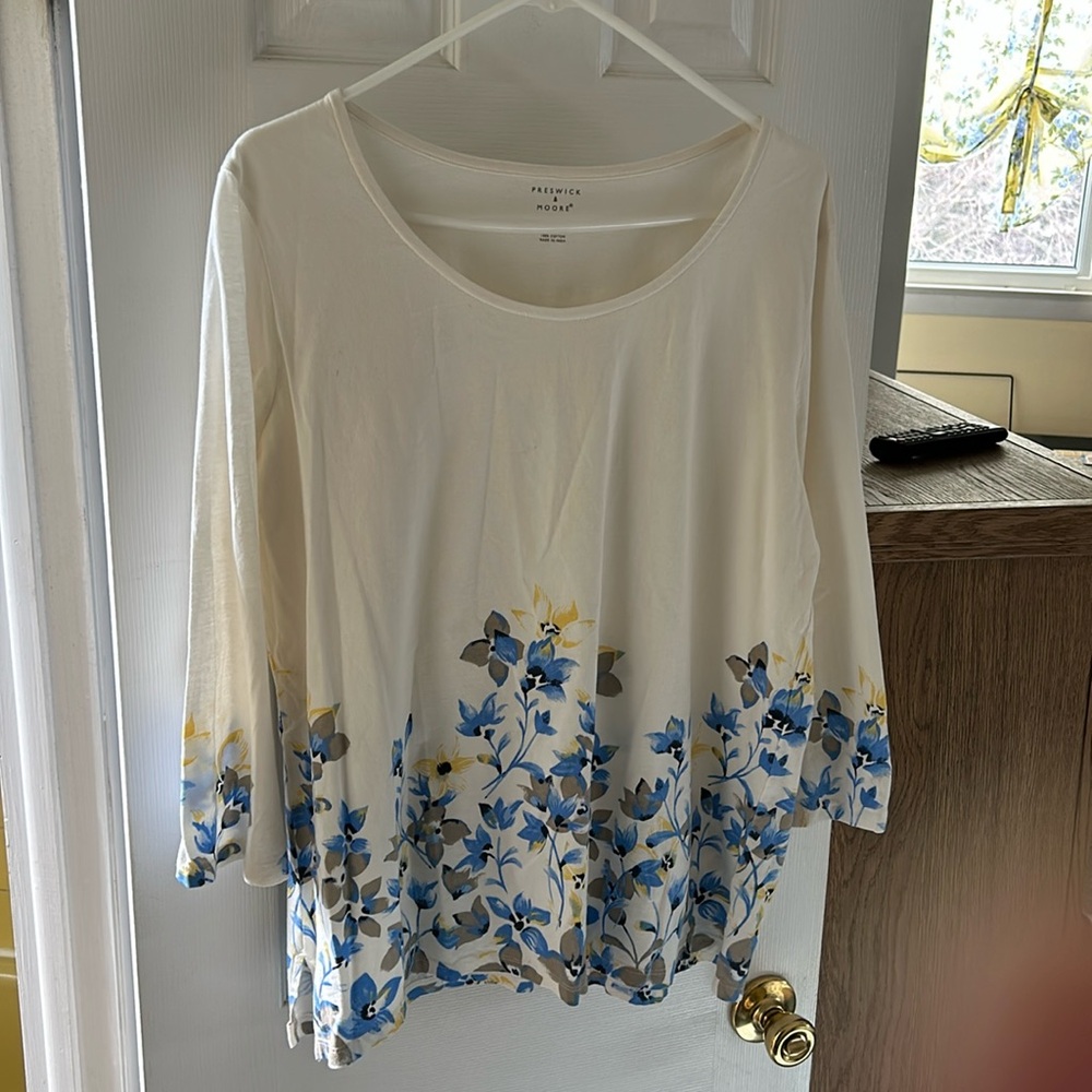 Women’s size large white and floral quarter length sleeve top